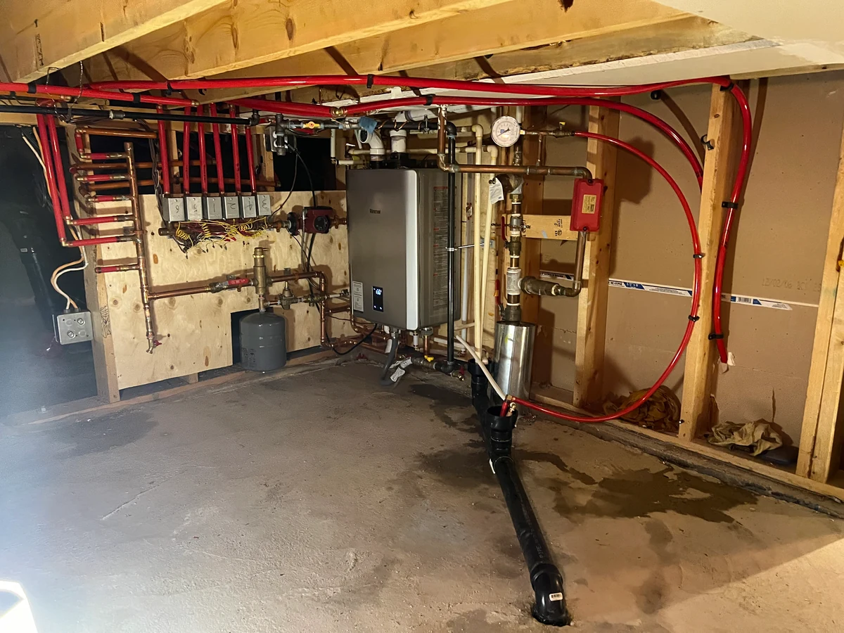 Basement heating equipment shown in the Vancouver West doctor’s home project source photo